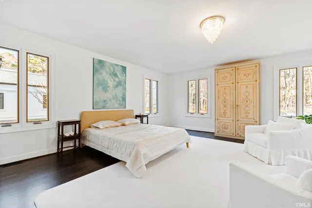 a kitchen with stainless steel appliances a refrigerator and a stove top oven