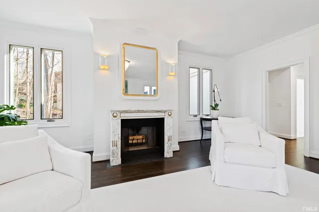 a view of a kitchen with a sink dishwasher and a refrigerator