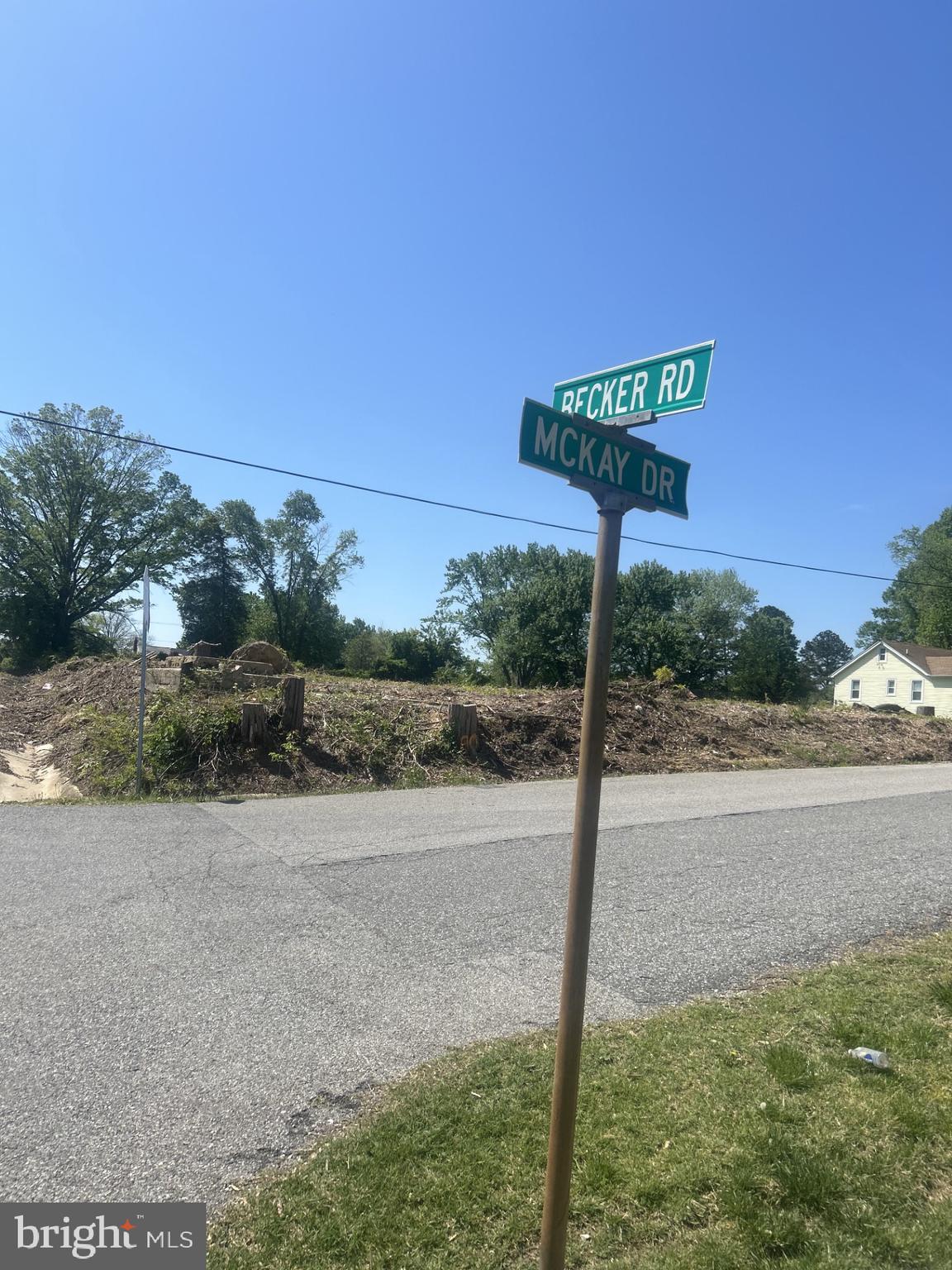 Mckay Drive Brandywine, MD 20613 - Photo 6 of 6 a street sign sitting on the side of a road
