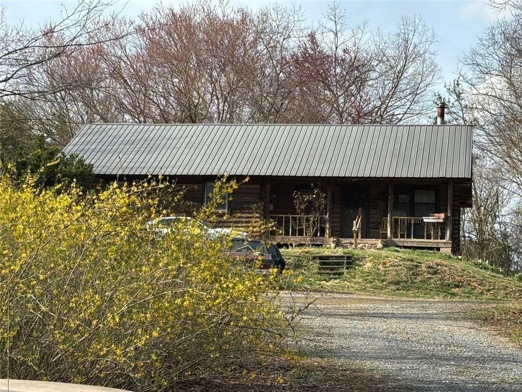 292 Shirley Road Southeast Ranger, GA 30734 - Photo 3 of 80 a front view of a house with garden