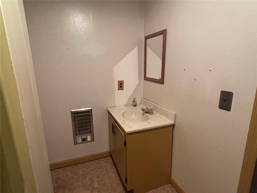 292 Shirley Road Southeast Ranger, GA 30734 - Photo 33 of 80 a bathroom with a sink toilet and mirror