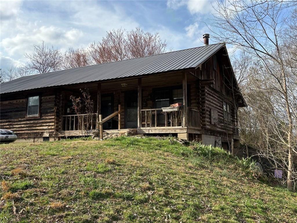 292 Shirley Road Southeast Ranger, GA 30734 - Photo 4 of 80 a backyard of a house with table and chairs