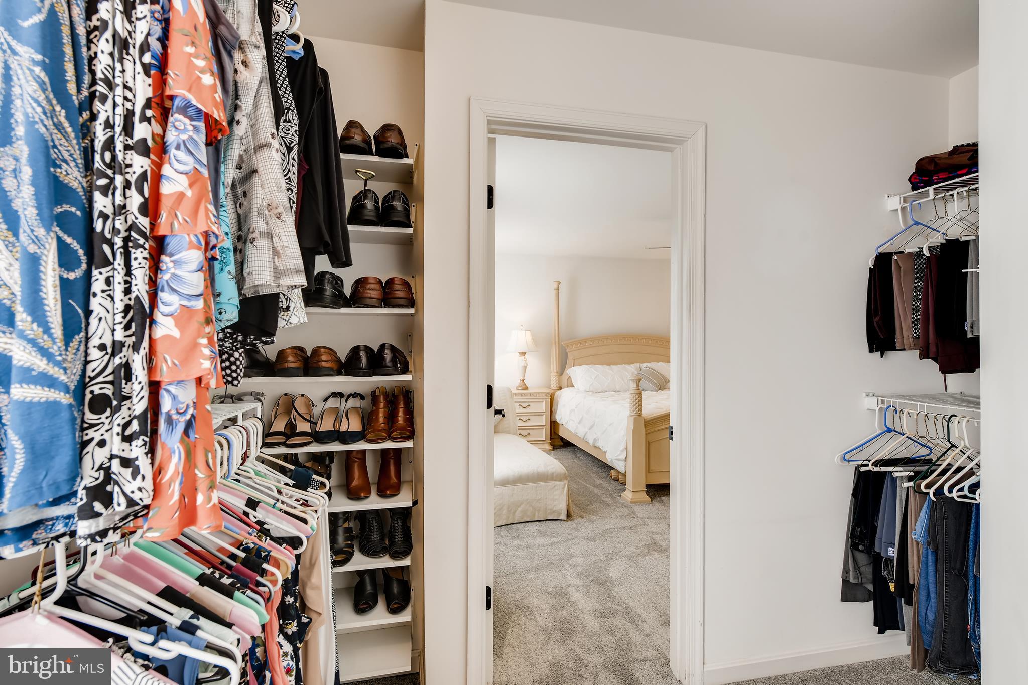 9526 Good Spring Drive Perry Hall, MD 21128 - Photo 19 of 42 a view of walk in closet with clothes and shoes