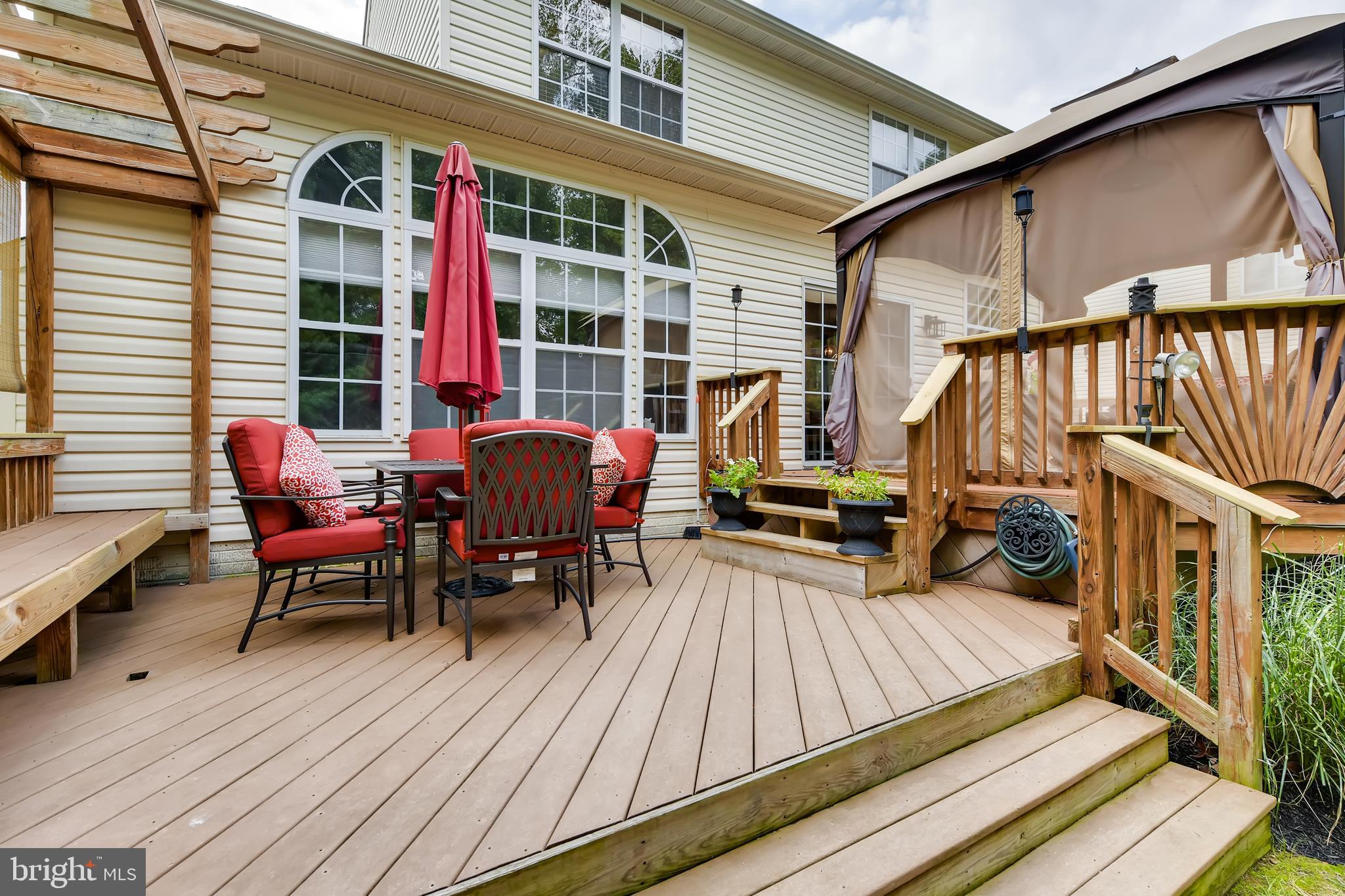 9526 Good Spring Drive Perry Hall, MD 21128 - Photo 36 of 42 a view of a deck with chairs and wooden floor