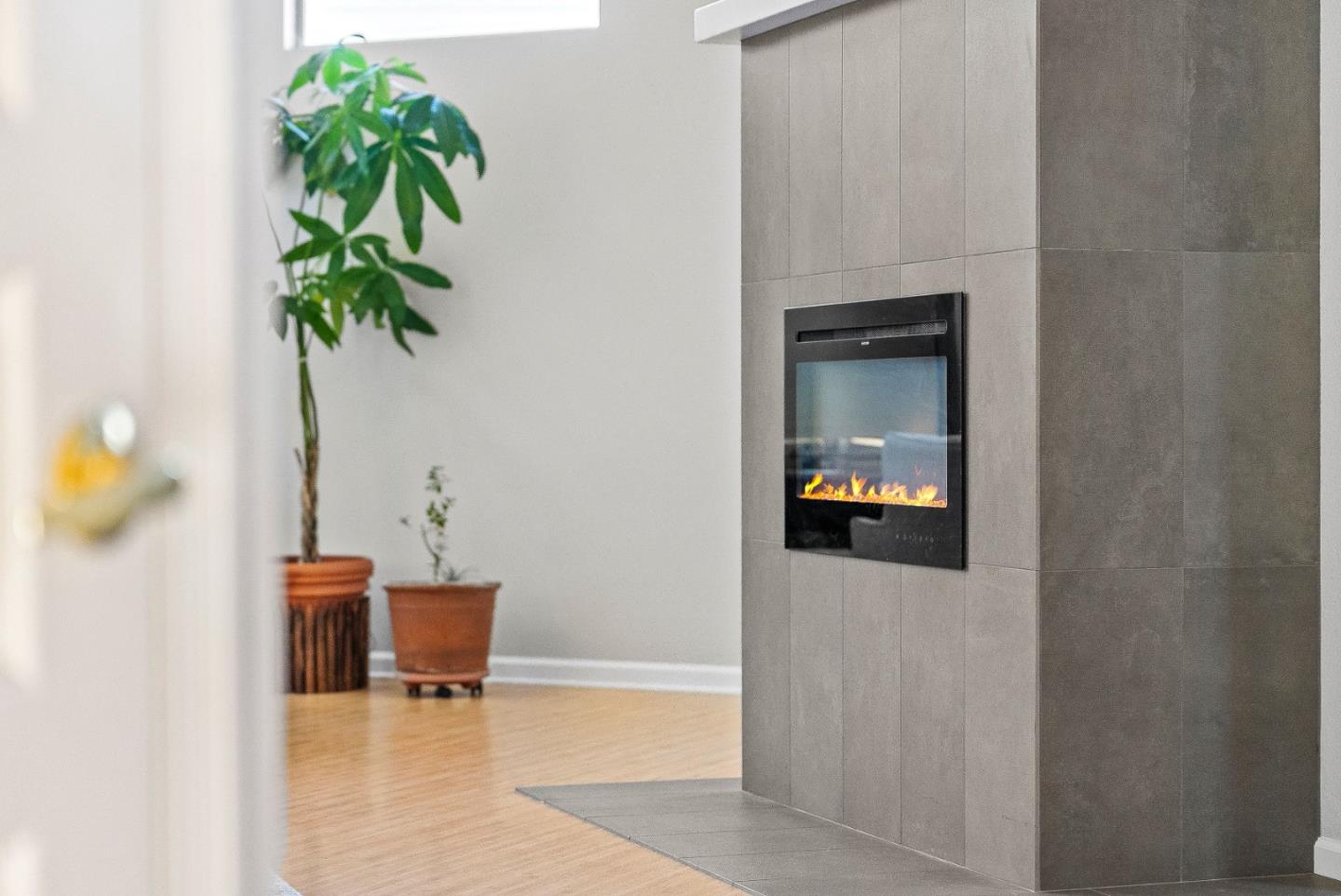 3200 Axford Road Santa Cruz, CA 95062 - Photo 12 of 45 a hallway with a chair and a potted plant