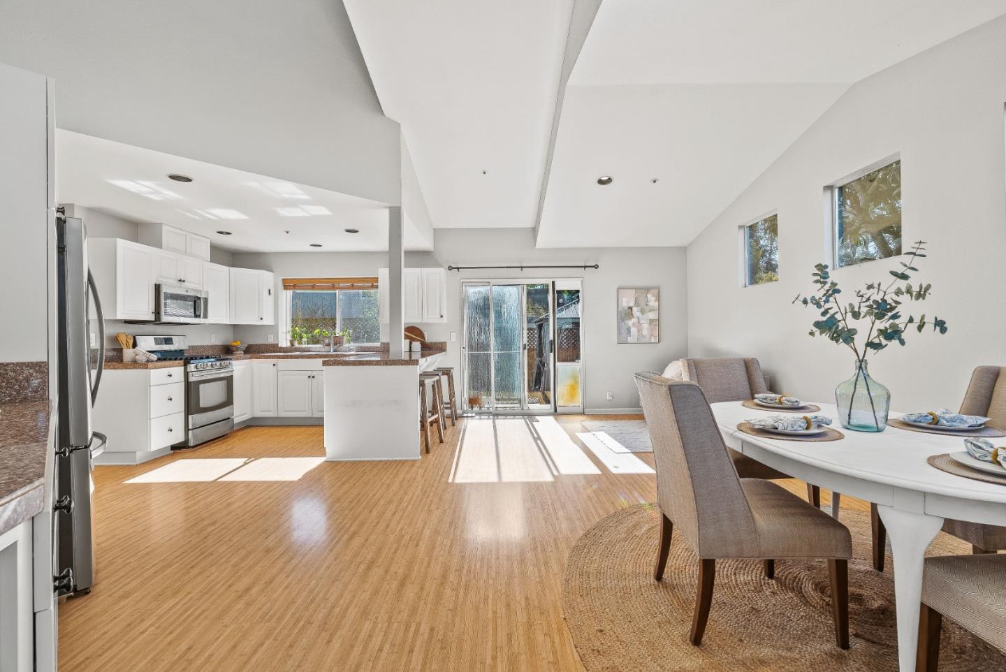 3200 Axford Road Santa Cruz, CA 95062 - Photo 14 of 45 a living room with stainless steel appliances kitchen island granite countertop furniture and wooden floor
