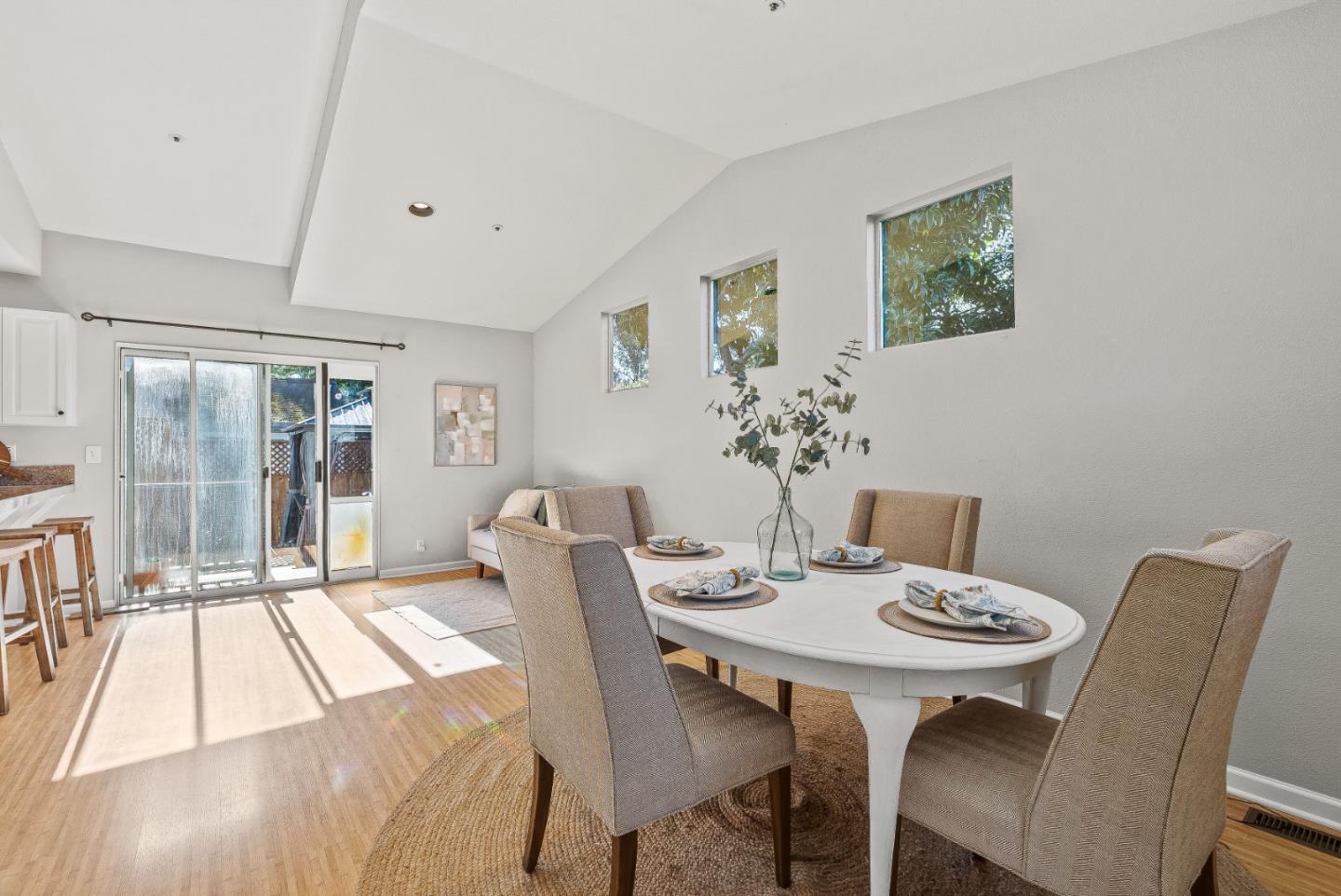 3200 Axford Road Santa Cruz, CA 95062 - Photo 15 of 45 a view of a dining room with furniture window and wooden floor