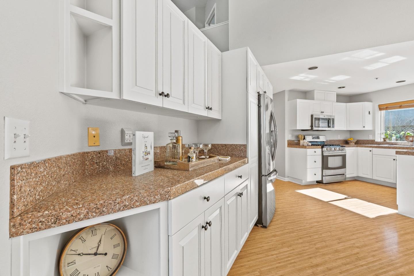3200 Axford Road Santa Cruz, CA 95062 - Photo 17 of 45 a kitchen with granite countertop a sink a stove and cabinets