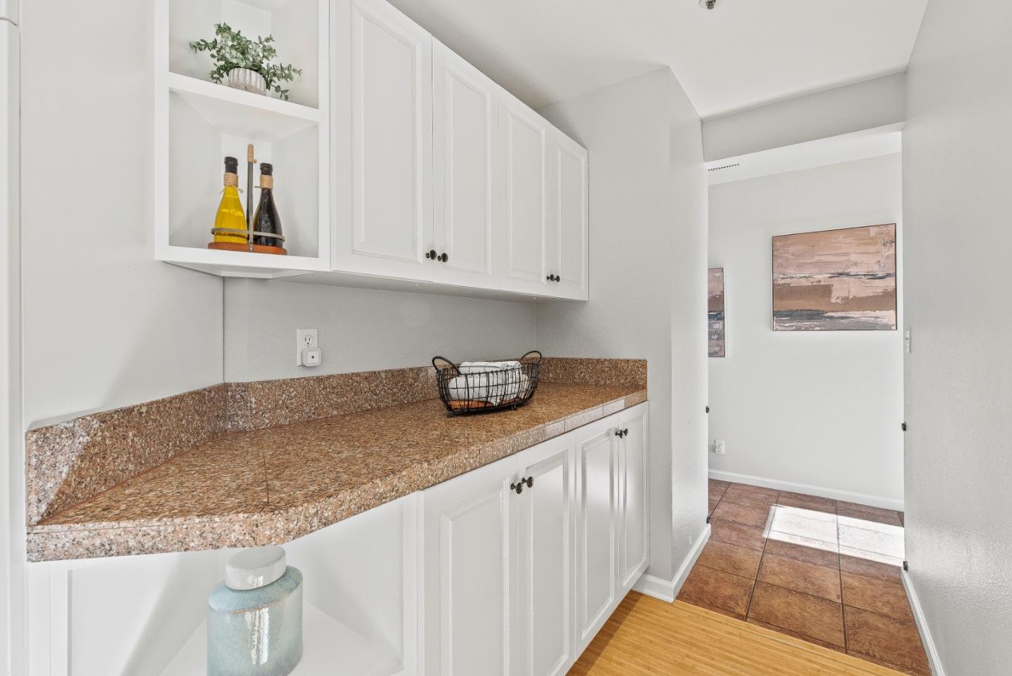 3200 Axford Road Santa Cruz, CA 95062 - Photo 21 of 45 a kitchen with stainless steel appliances granite countertop a sink and a white cabinets