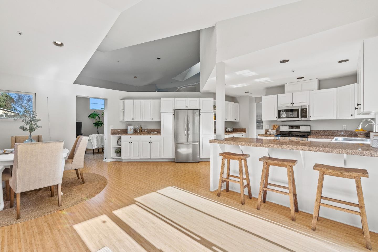 3200 Axford Road Santa Cruz, CA 95062 - Photo 24 of 45 a living room with stainless steel appliances kitchen island granite countertop furniture and a kitchen view