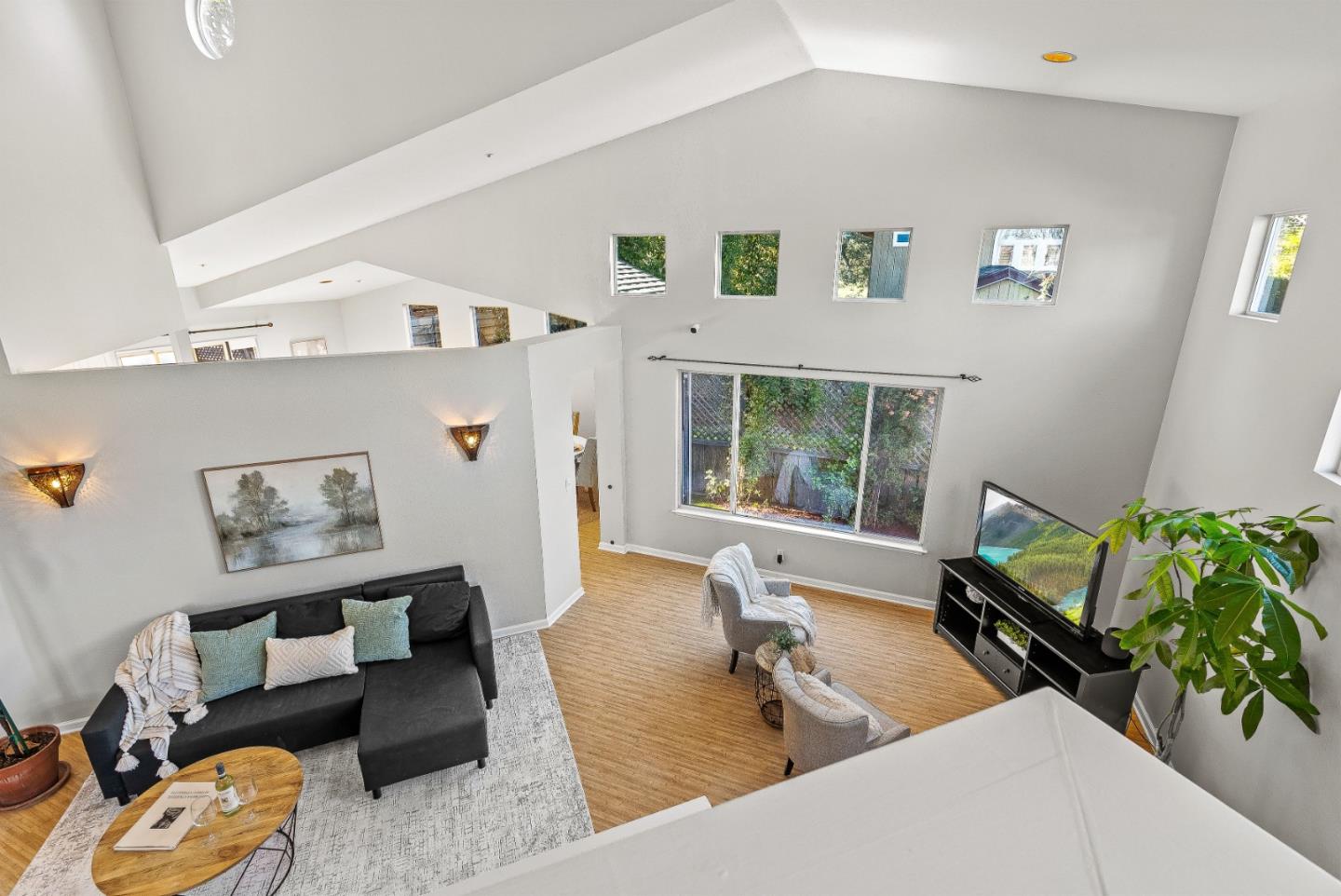 3200 Axford Road Santa Cruz, CA 95062 - Photo 28 of 45 a living room with furniture and a potted plant