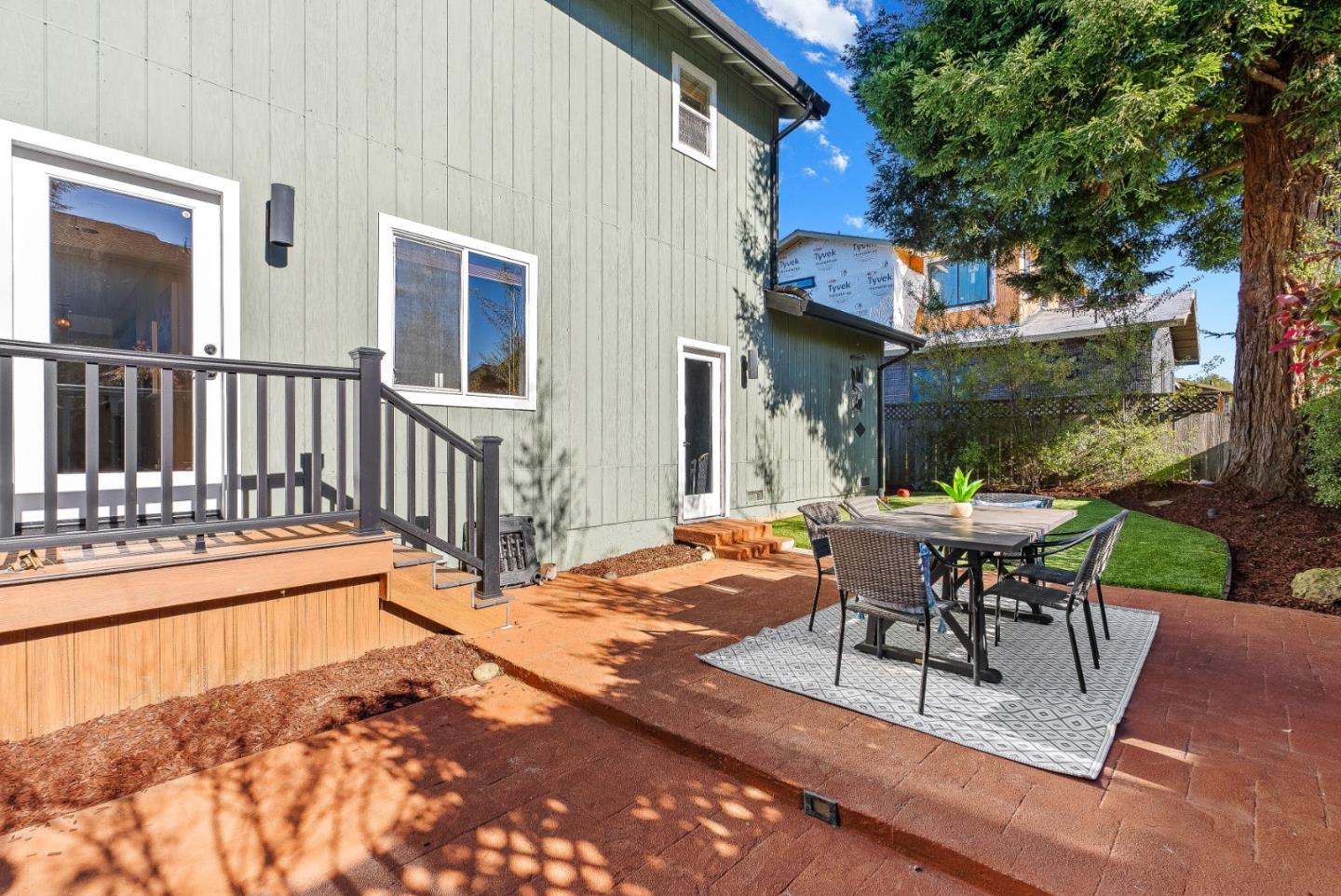3200 Axford Road Santa Cruz, CA 95062 - Photo 39 of 45 a view of a patio with a table and chairs