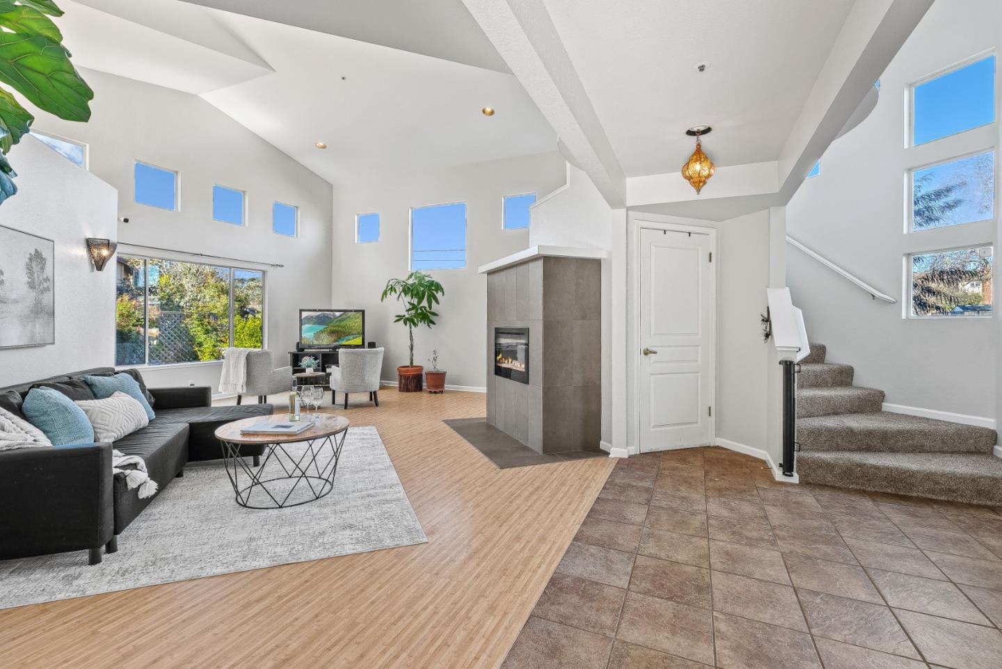 3200 Axford Road Santa Cruz, CA 95062 - Photo 9 of 45 a living room with furniture and a fireplace