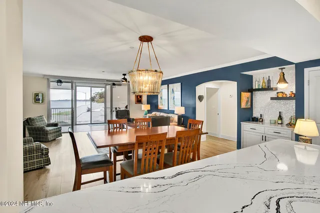 a view of a dining room with furniture