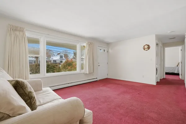 a view of livingroom with furniture and window