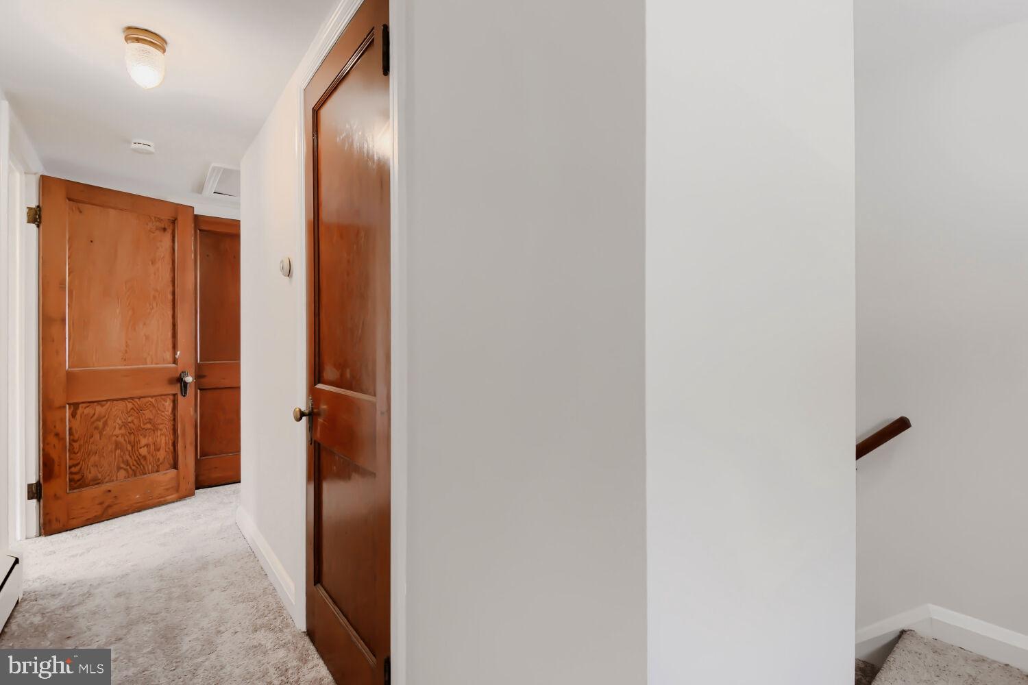 1311 Brehm Road Westminster, MD 21157 - Photo 16 of 37 UL Hallway with Plush Carpet | Spacious Closets