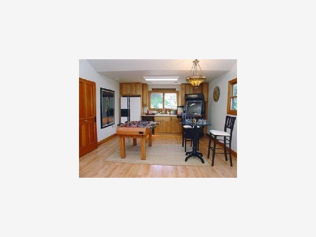 1140 Border Road Los Altos, CA 94024 - Photo 8 of 9 a living room with furniture and a fireplace