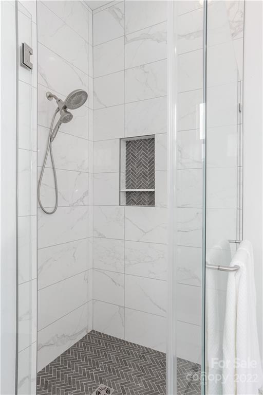 112 Meadow Breeze Road Arden, NC 28704 - Photo 24 of 44 a bathroom with a shower