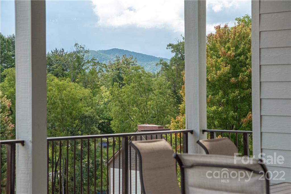 112 Meadow Breeze Road Arden, NC 28704 - Photo 36 of 44 a view of a balcony with furniture