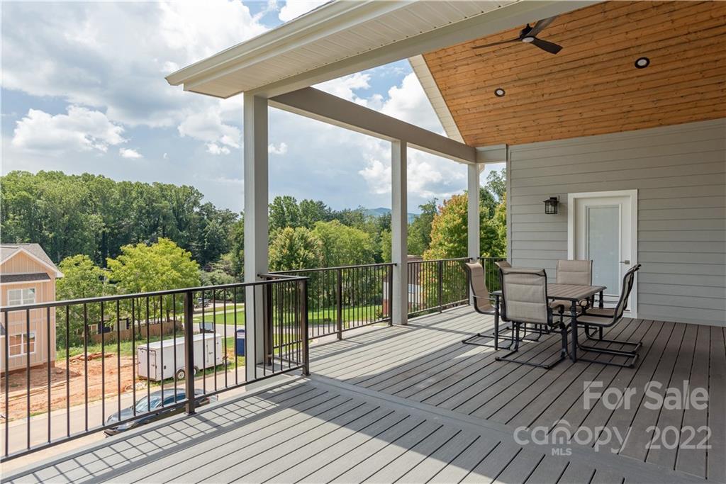 112 Meadow Breeze Road Arden, NC 28704 - Photo 38 of 44 a view of a chairs on the roof deck