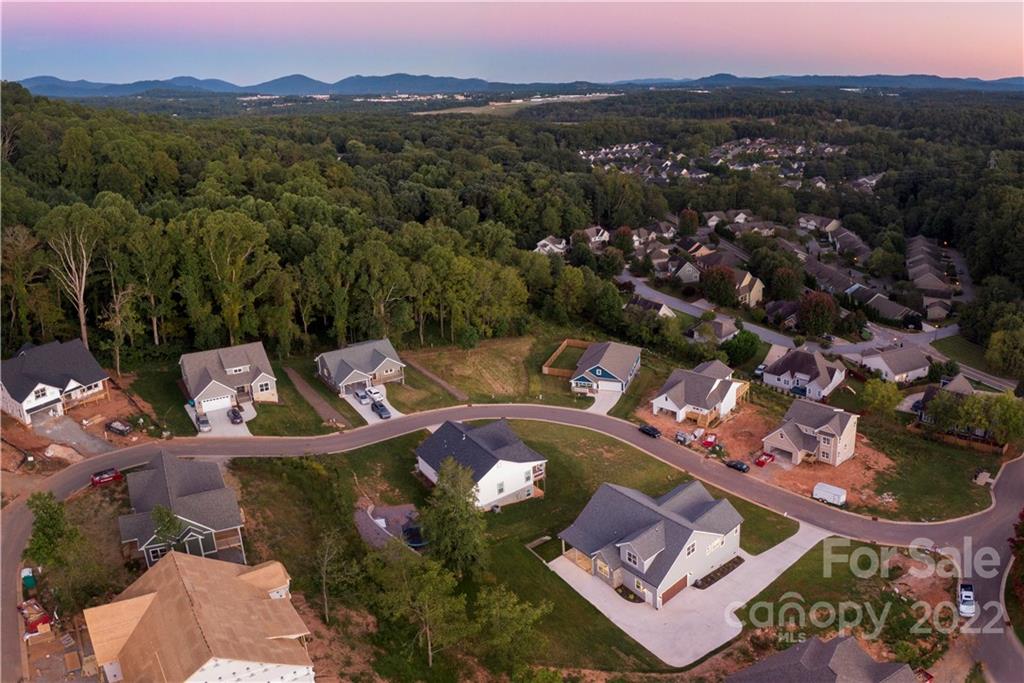 112 Meadow Breeze Road Arden, NC 28704 - Photo 44 of 44 an aerial view of a house with a yard