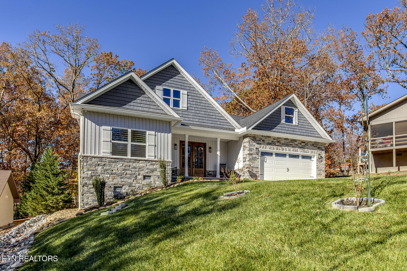 173 Chahyga Way Loudon, TN 37774 - Photo 3 of 60 03_ChahygaWay_173_FrontLeft