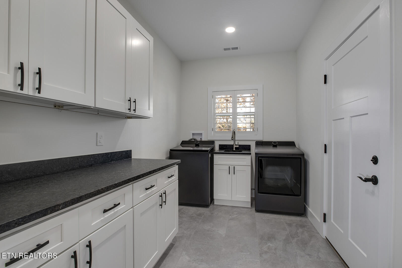 173 Chahyga Way Loudon, TN 37774 - Photo 44 of 60 44_ChahygaWay_173_Laundry-GarageEntry2