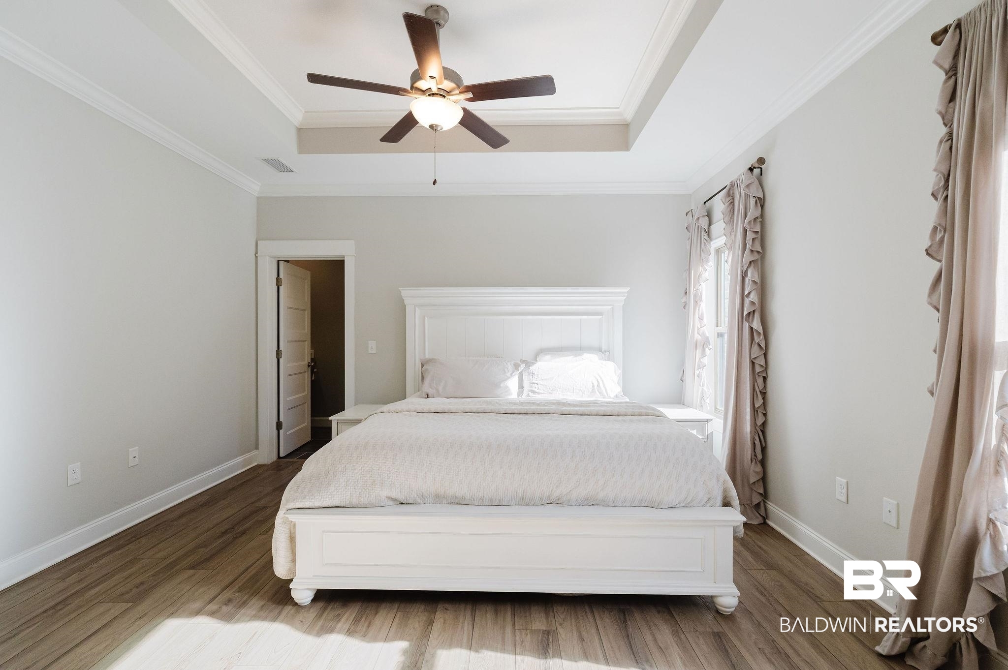 7872 Calverton Street Foley, AL 36535 - Photo 14 of 76 Tray ceiling with crown molding and ceiling fan