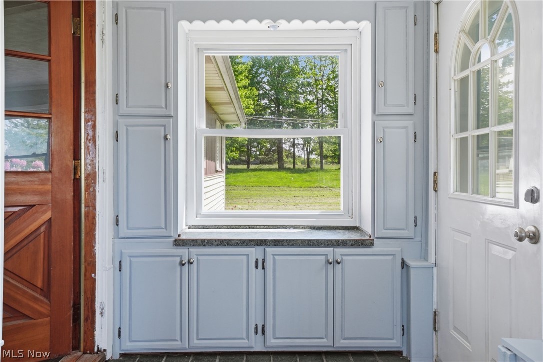 720 Keefus Road Conneaut, OH 44030 - Photo 13 of 33 Enclosed front porch