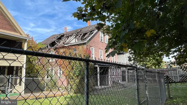 a brick house with a large windows