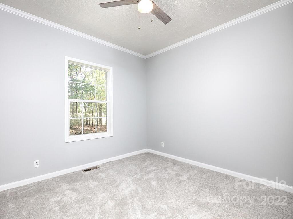 3609 Lee Moore Road Maiden, NC 28650 - Photo 33 of 48 an empty room with a window