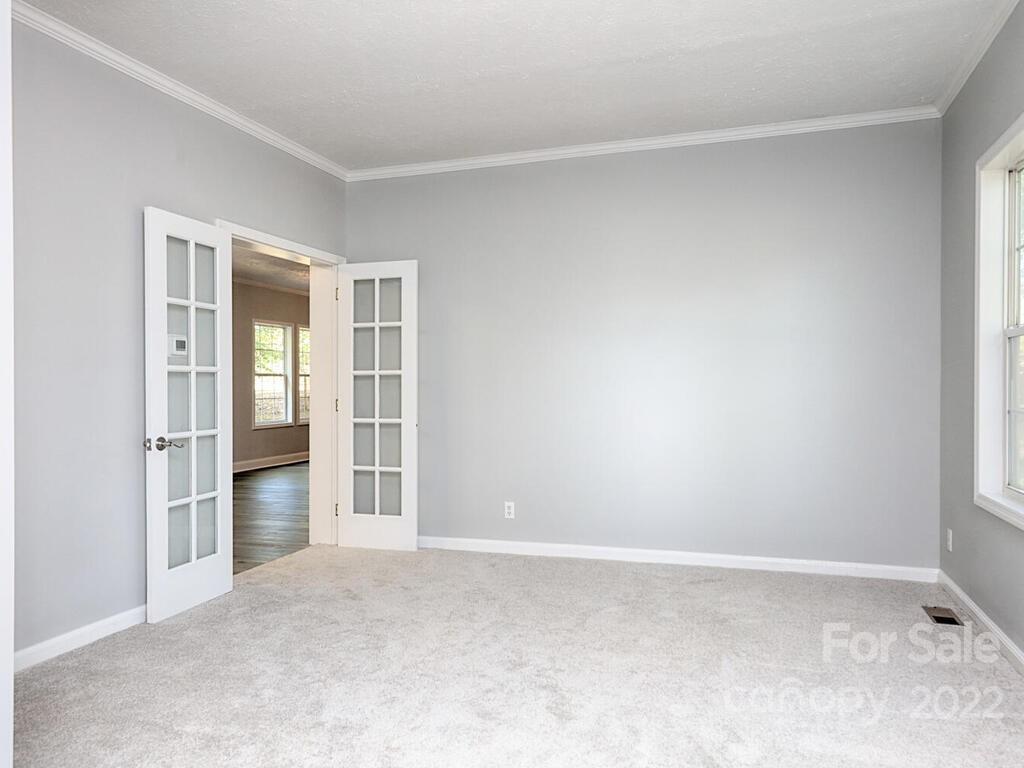 3609 Lee Moore Road Maiden, NC 28650 - Photo 8 of 48 a view of an empty room with a kitchen