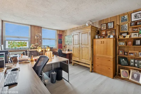 a view of a livingroom with furniture and window