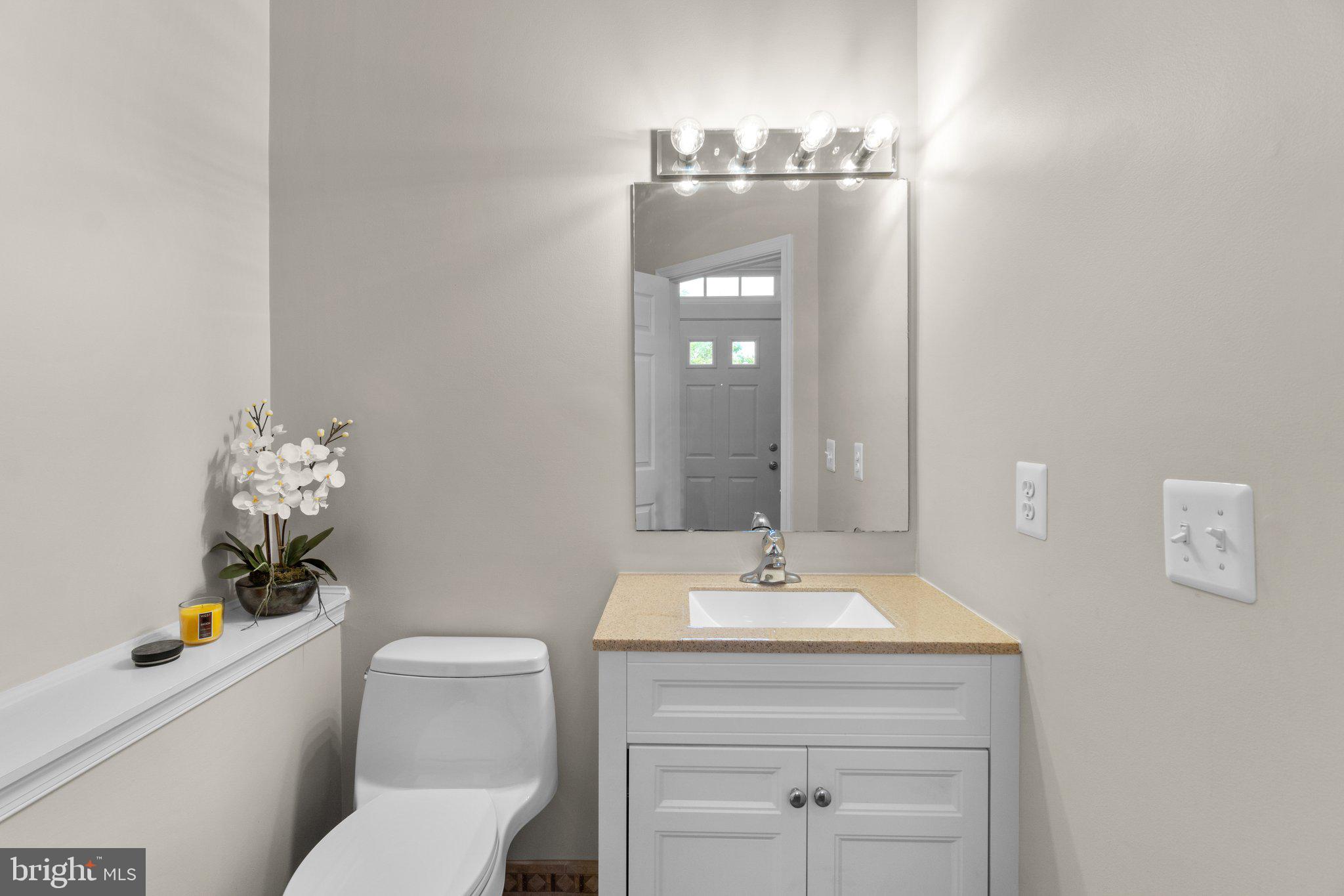 14655 Winterfield Drive Centreville, VA 20120 - Photo 3 of 48 Half bath in foyer at entrance