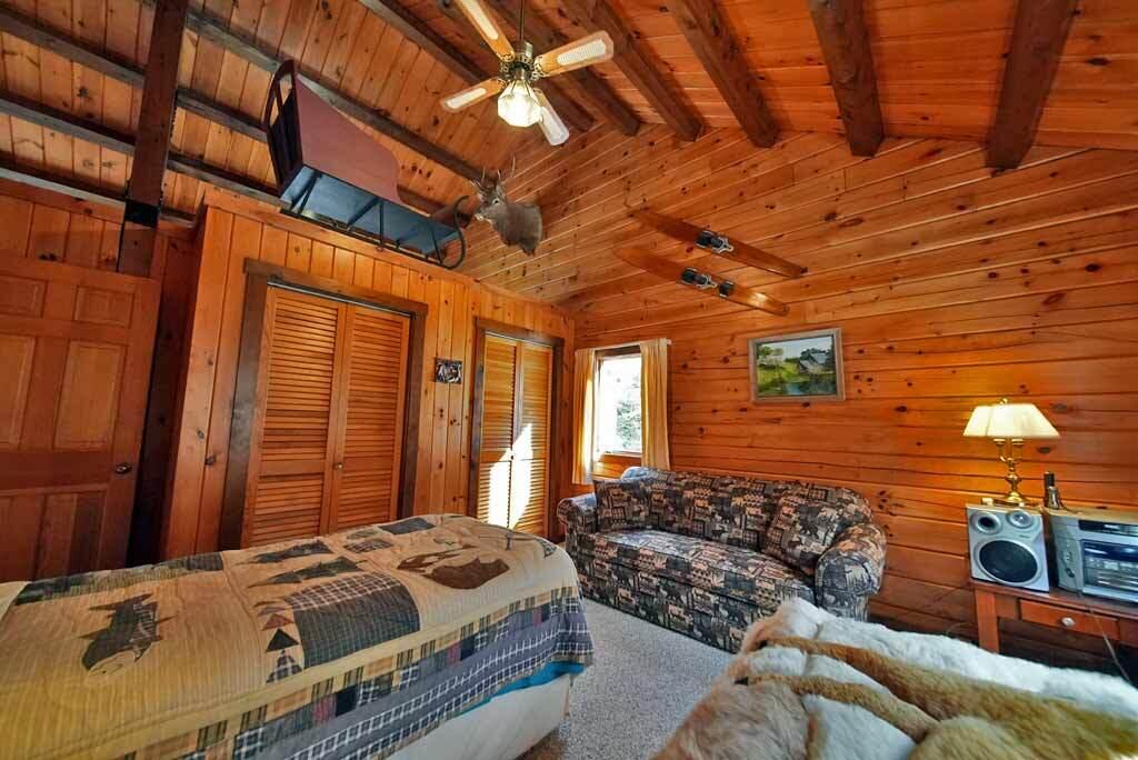 1058 Highway 1 Weston, ME 04424 - Photo 53 of 94 log-home-bedroom-3