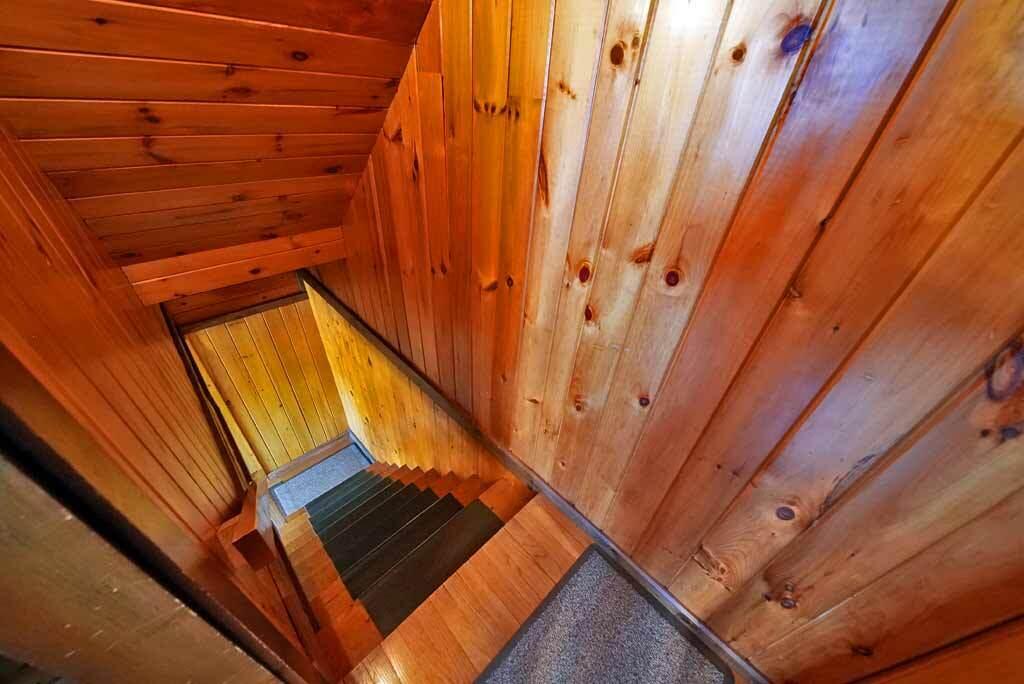 1058 Highway 1 Weston, ME 04424 - Photo 65 of 94 basement-finished-stairway