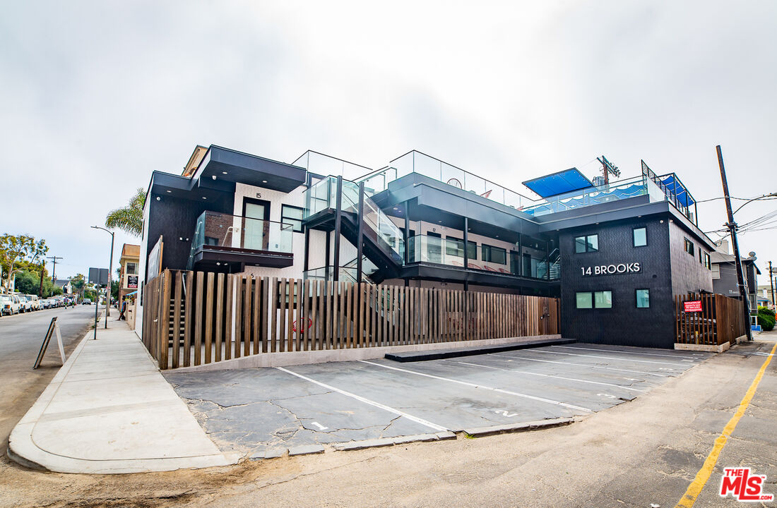 14 Brooks Avenue, Unit 8 Venice, CA 90291 - Photo 1 of 13 a view of a house with a park bench