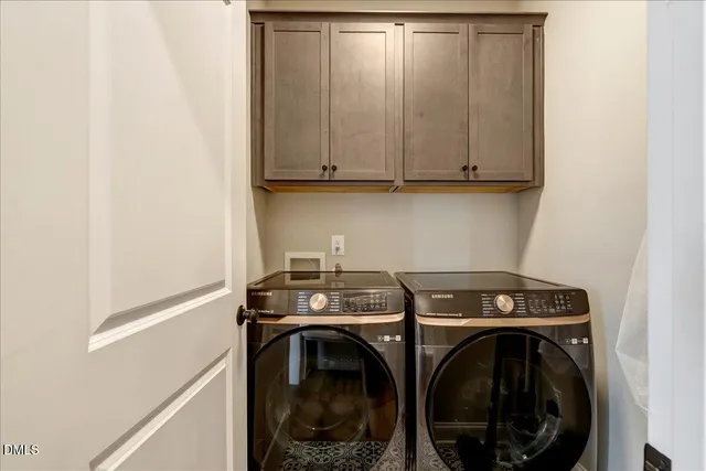 a kitchen with a sink and a large window