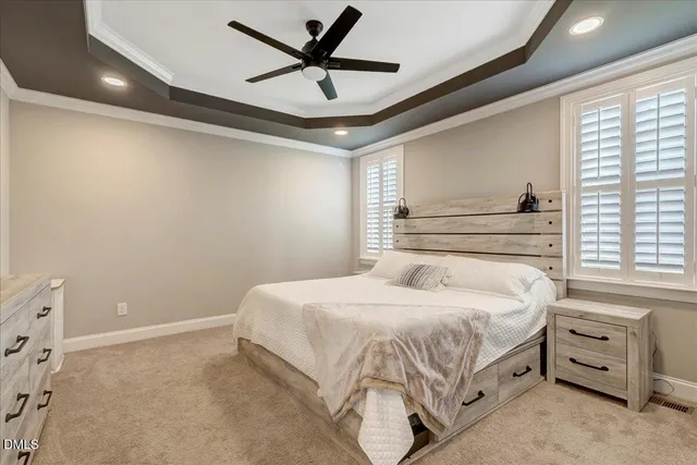 a kitchen with granite countertop center island a stove a sink a dining table and chairs