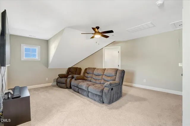 a bathroom with double vanity sinks and a mirror
