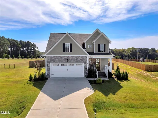 a view of swimming pool with seating area and furniture