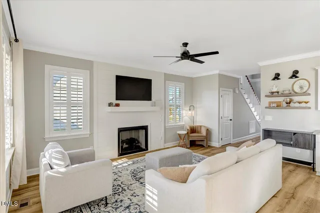 a bathroom with a double vanity sink toilet and shower