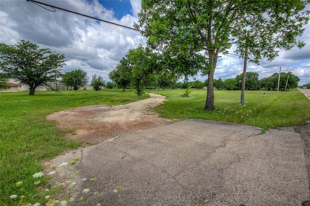221 Maple Street Commerce, TX 75428 - Photo 18 of 19 a view of a park and trees