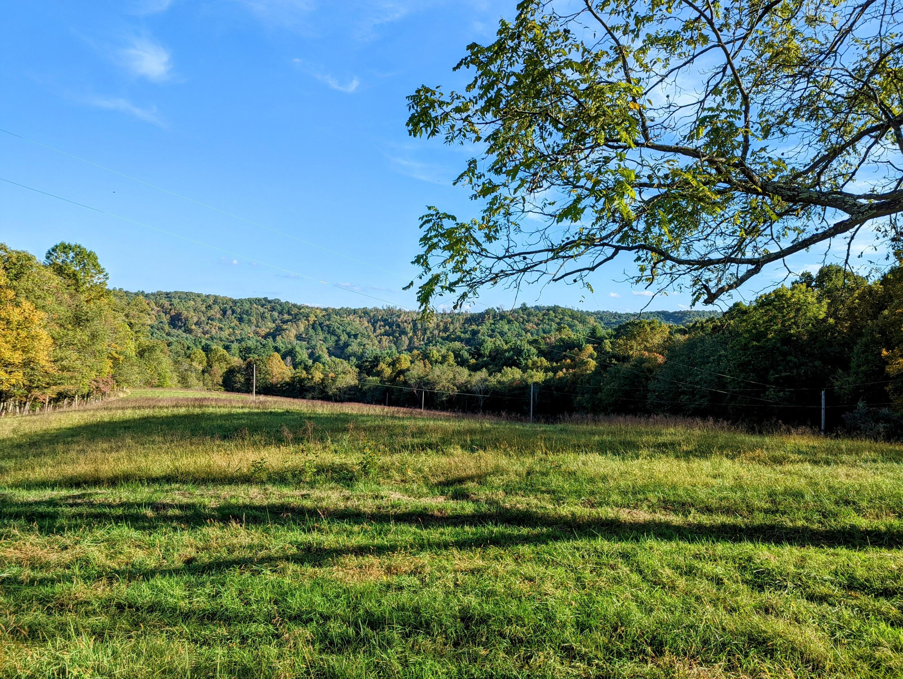 0 Laurel Creek Road Northeast Pilot, VA 24138 - Photo 5 of 53 a view of a lake with a house in the background