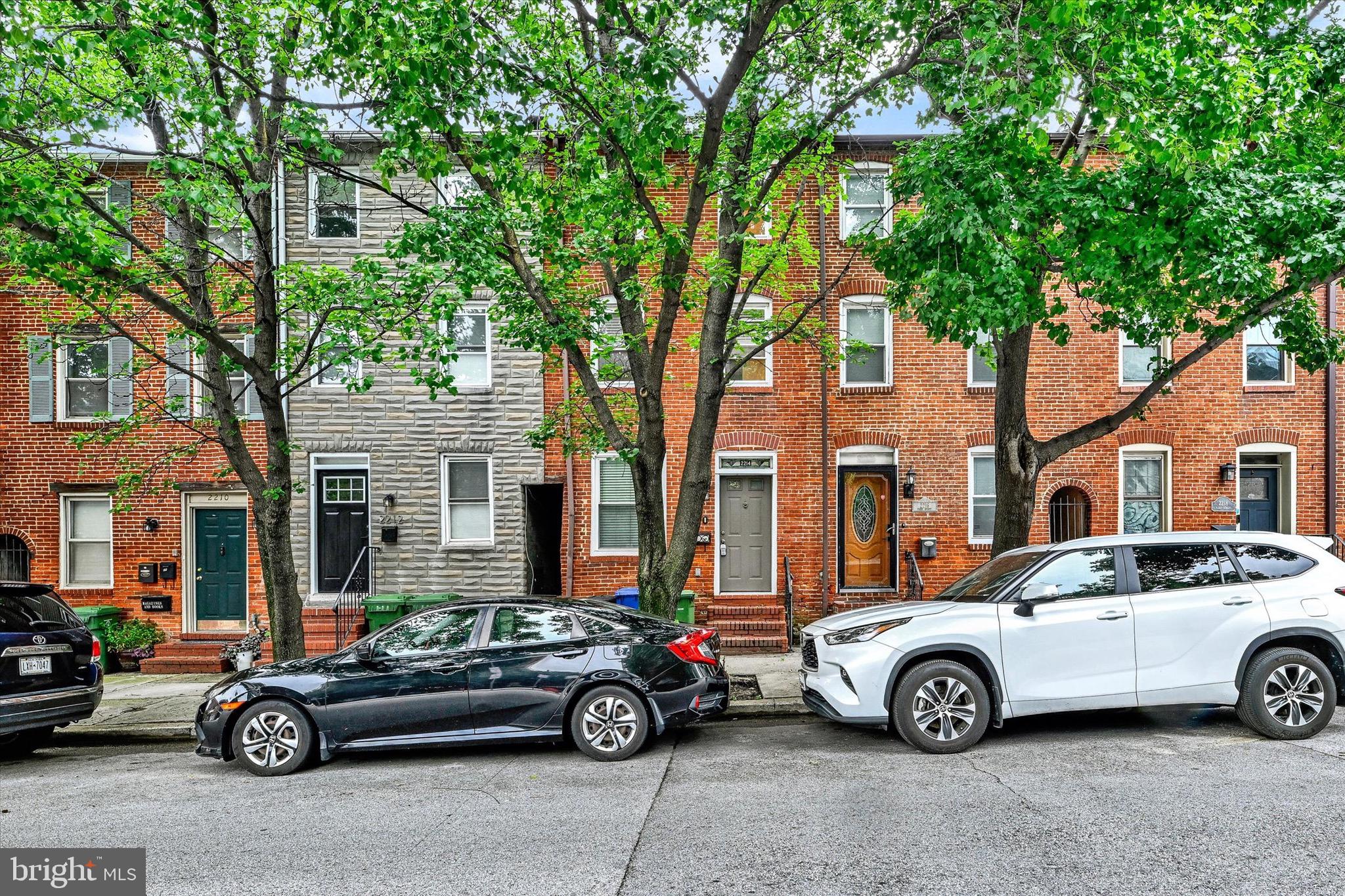 a car parked in front of a house