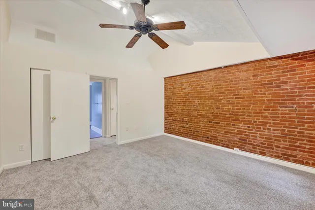 a view of livingroom with ceiling fan