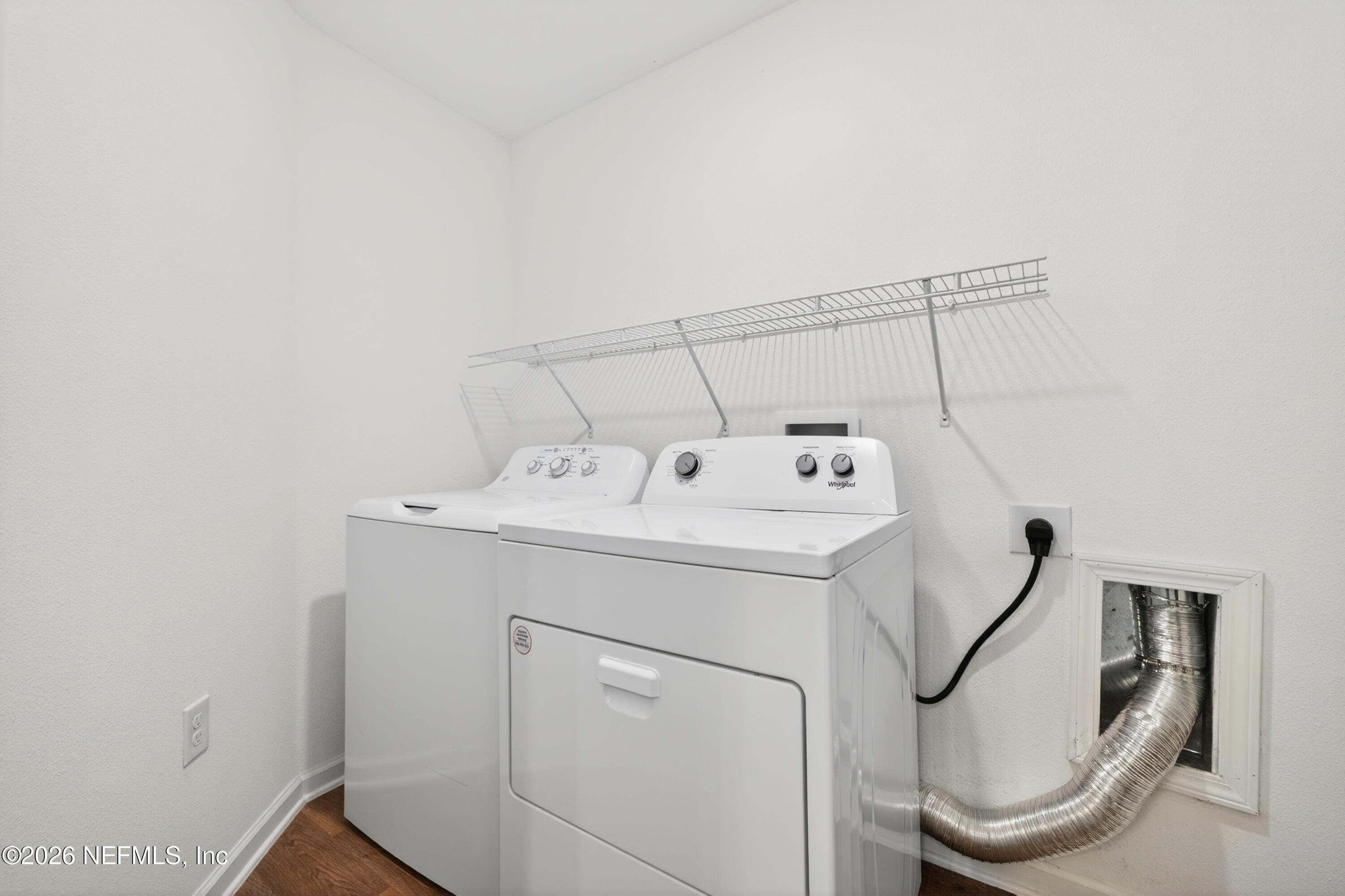 231 Encanto Way Street St. Augustine, FL 32084 - Photo 10 of 36 a utility room with dryer and washer