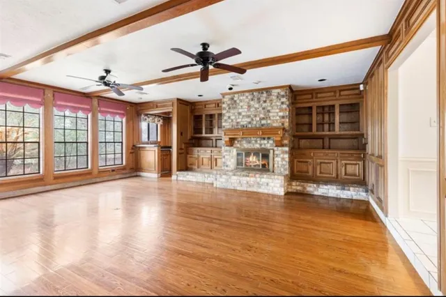 a view of a living room with a large window