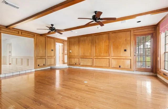 a view of an empty room and window