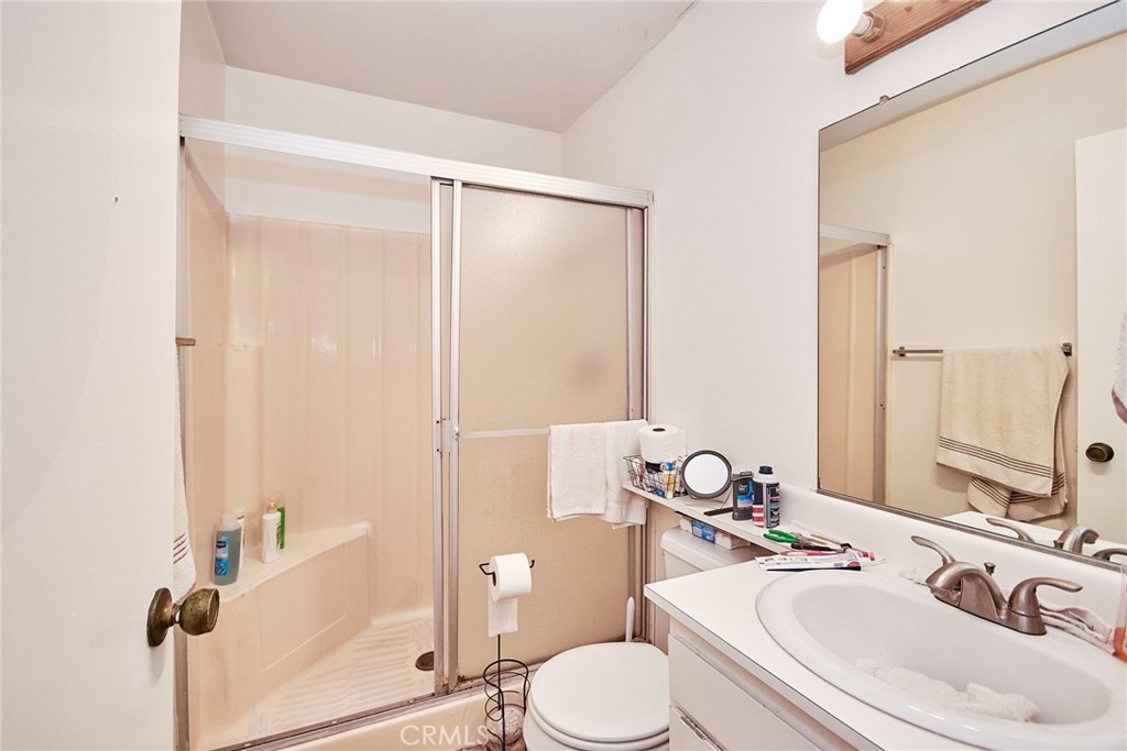 20309 East Vejar Road Walnut, CA 91789 - Photo 21 of 29 a bathroom with a sink toilet and shower